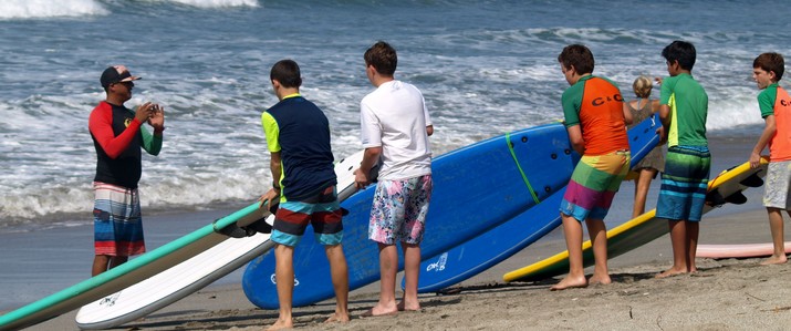 Cours de surf sur le sable C&C surf planche cours sable