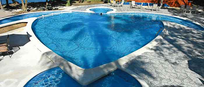 Aninga Hotel & Spa - Piscine Aninga Hotel & Spa piscine détente chaises longues