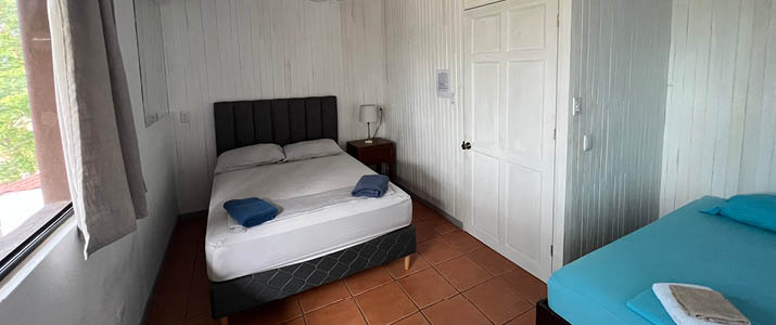 Blue Dream maison - chambre double chambre en angle droit avec deux lits